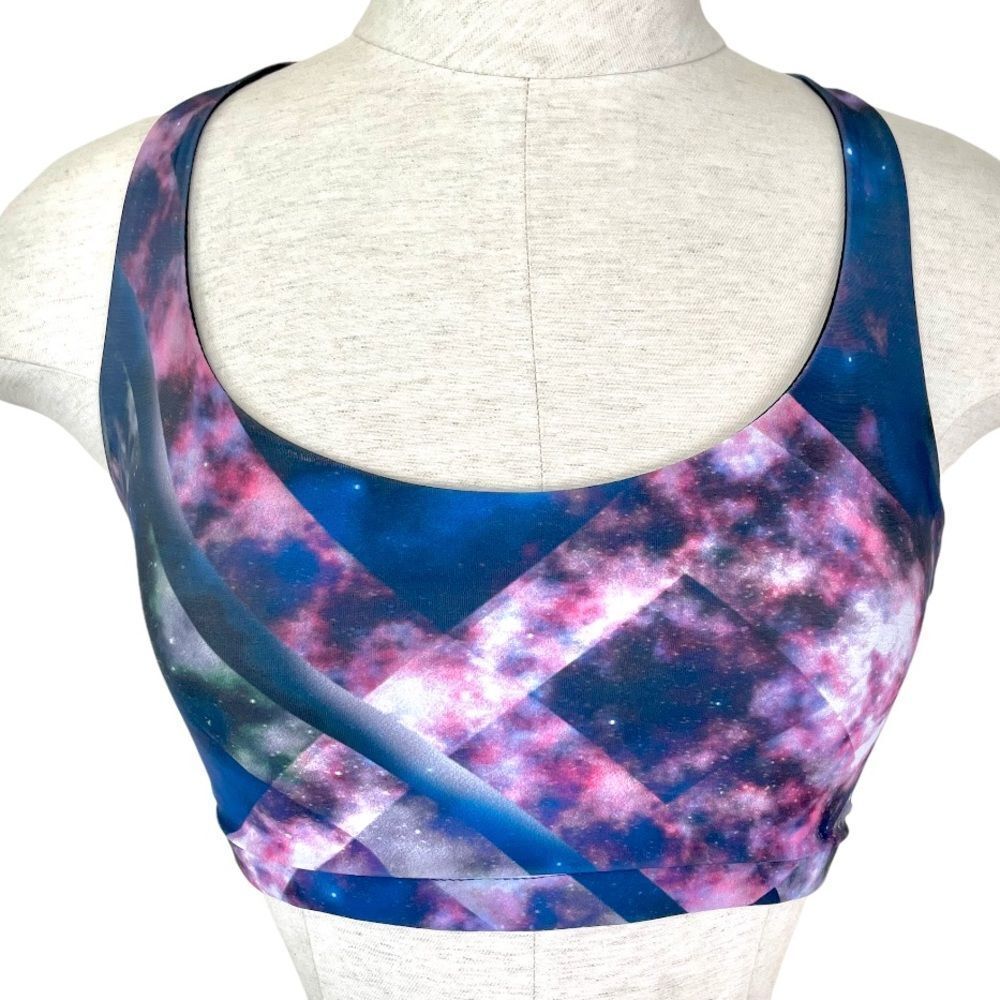 Onzie pink purple galaxy sports bra